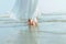 foot of romantic time loving couple dance on the beach. Love travel concept. Honeymoon concept