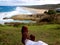 Foot selfie person stunning surfing beach, North Stradbroke Island, Australia