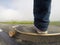 Foot on the skateboard closeup,