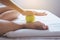 Foot soles massage,Woman hand giving massage with tennis ball to her foots in bedroom