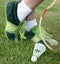 Foot of sportswoman on grass