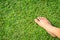 Foot step on green grass