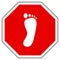 Foot and stop sign