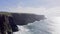 footage in 4k of the cliffs of Mother in Ireland. Irish famous place. Rough sea, wind, seagulls, sunny day