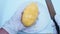 Footage full HD 1080P, person wearing white gloves, peeling ripe mango, on a white plate