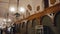 Footage of the interior of Krakow Sukiennice Cloth hall - Rustic lighting