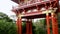 footage of the Japanese Tea Garden at Golden Gate Park with lush green trees, plants, grass and Japanese style buildings