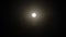 Footage of moon. close up of a semi-circular moon at night