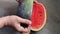 Footage of red slices of watermelon fruit cut