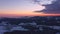 Footage of Sunset in winter with snow and ice with view from Rusel towards Schaufling and Landshut, Germany