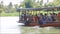 The footage of Thai wooden Sightseeing boat for tourist traveling in a river.