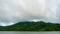 Footage Timelapse Dark sky and black cloud. Black clouds moving fast in Dramatic sky over mountains.Dark stormy raining cloudy nat