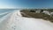 Footage of turquoise transparent water and blue sea in Siesta Key beach. Drone Fly video over beach in Siesta Key