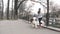 Footage of young girl running with her dog, alaskan malamute