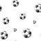 Football backdrop. Hand drawn seamless pattern with sketch style soccer balls. Black on white. Vector background.