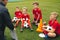 Football coach coaching children. Soccer football training session for children