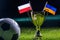 Football cup and Polish and Ukraine flags