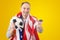 football fan with a deformed crumpled ball and an American flag