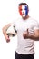 Football fan of France national team with ball in arm show okey sign