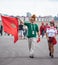 Football fans of Morocco at 2018 FIFA world cup in Russia with flag and lion cap