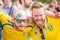 Football fans from Sweden with painted faces in national colors before the match England Sweden at the World Cup