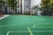 Football field in the city. A playground for active games and sports. Space for text. Blurred