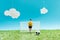Football field with toy goalkeeper near miniature football on blue background with clouds