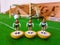 Football figures lined up on a grass field