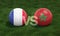 Football with France vs. Morocco 3D ball soccer flags on green football field