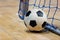 Football futsal ball goal and floor. Indoor soccer sports hall. Sport Futsal background. Indoor Soccer Winter League