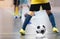 Football futsal player, ball, futsal floor. Sports background.