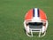 Football Helmet on Grass Field