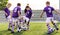 Football Kids Playing Game. Two Players in Opposing Teams in a Duel