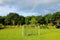 Football outdoors in yard after rain