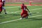 Football player kicking a field goal