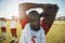 Football player, soccer and stretching black man doing sports training on field for warm up exercise on arms for