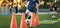 Football Player on Training Slalom Drill With Ball. Soccer Boy Running