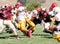 Football Players Colliding During a Game