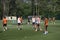 Football players warming up before training on a stadium. Shakhtar soccer team, sport base Sviatoshyn