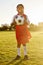 Football, portrait and girl soccer player on a sports ground ready for a ball game or training match outdoors. Smile