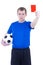 Football referee showing penalty card isolated