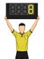 Football referee shows extra time, the soccer players change.