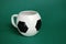 Football shaped cup isolated