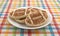 Football shaped sugar cookies on a plate