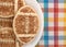 Football shaped sugar cookies on a plate