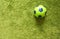 Football Soccer ball on a green surface imitating artificial grass. Sports photography