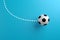 Football soccer ball moves in a curved direction. Kicking, bending or crossing the ball to the target