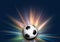 Football / soccer ball on starburst background