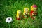 Football soccer ball and three nesting dolls in green. Winner,