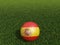 Football in Spain flag  on  green grass. 3d